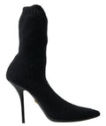 Bottes noires Dolce & Gabbana à talons stilettos, mi-mollet, pour femmes, en cuir élégant.