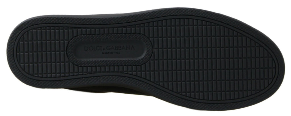 Chaussures sneakers classiques en cuir noir et or de Dolce & Gabbana, détail de design élégant et finition de qualité.
