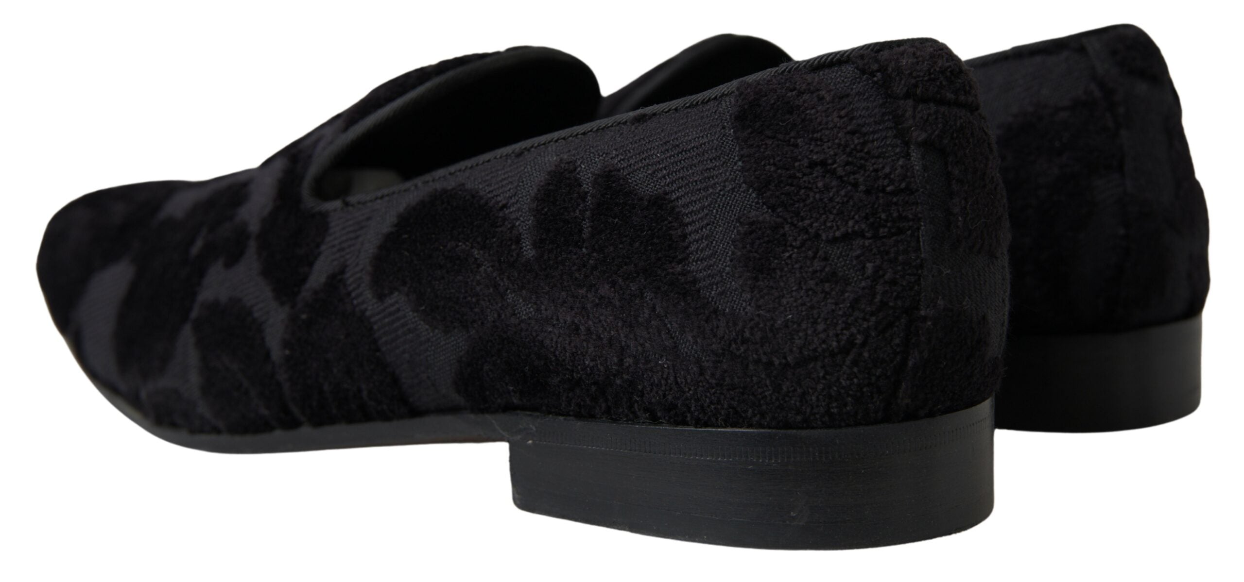 Mocassins noirs en brocart de Dolce & Gabbana, chaussures formelles élégantes avec finition raffinée.