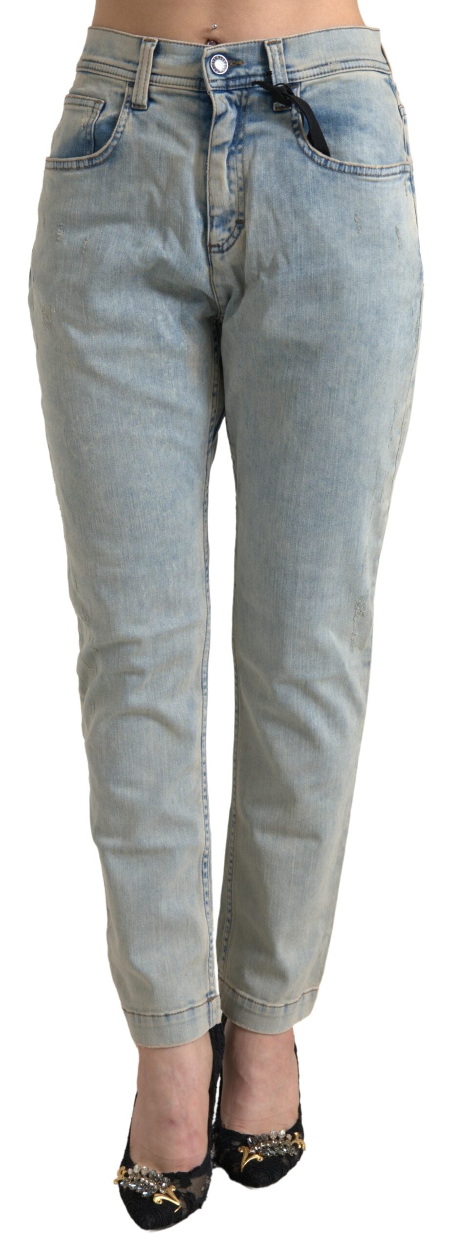Jean skinny en coton délavé bleu Dolce & Gabbana, taille mi-haute, ajusté et moderne, visible sur un mannequin.