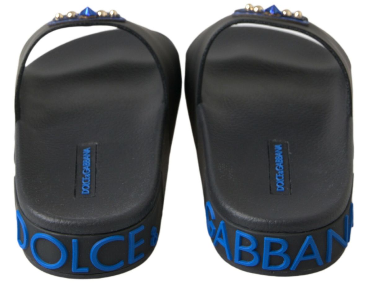 Sandales noires Dolce & Gabbana Slides pour la plage, chaussure Saint Barth, visibles avec détails en cuir et design élégant.