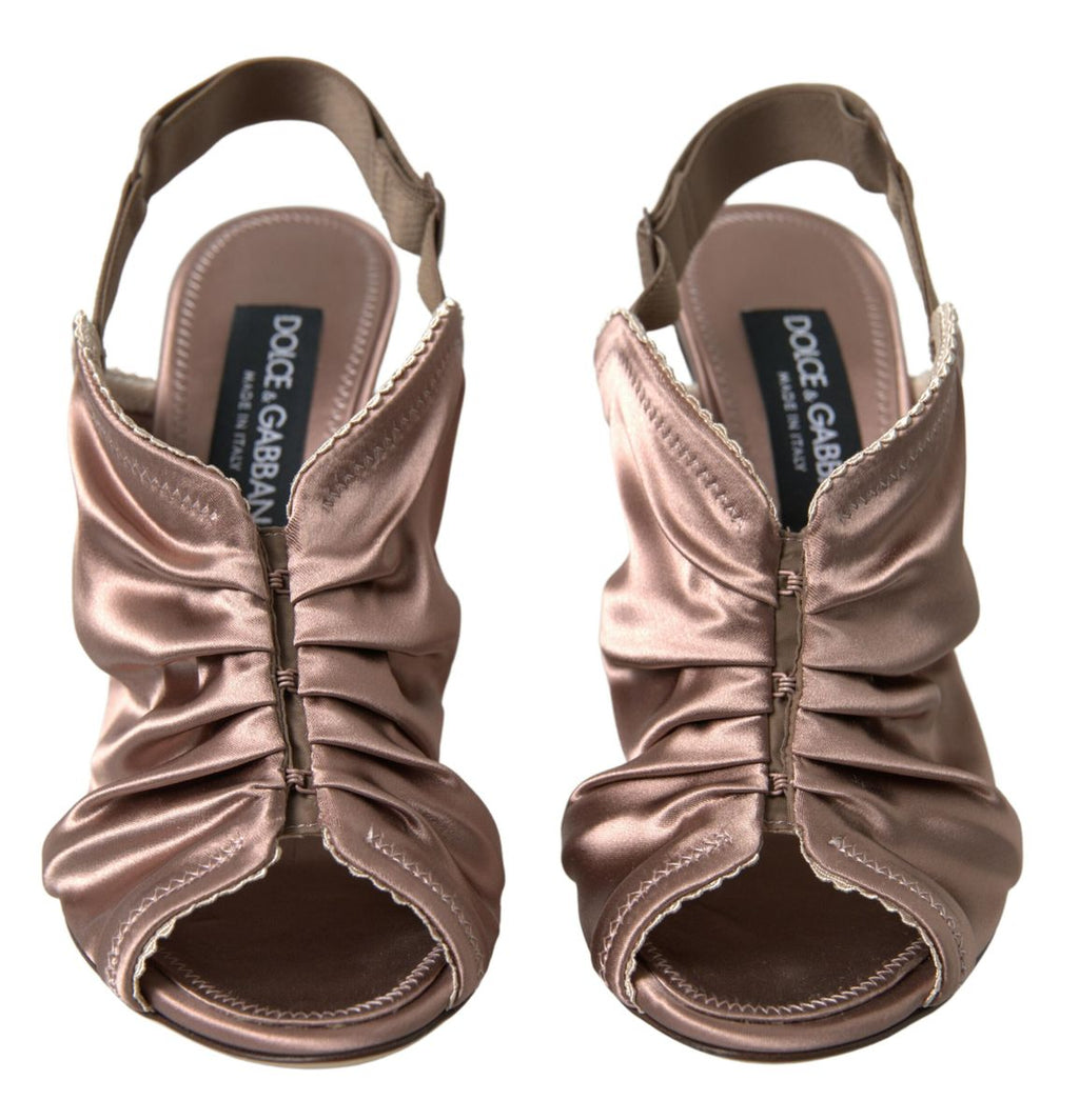 Escarpins stilettos Dolce & Gabbana beige clair à talon haut, style corset avec fermeture à sangle arrière.
