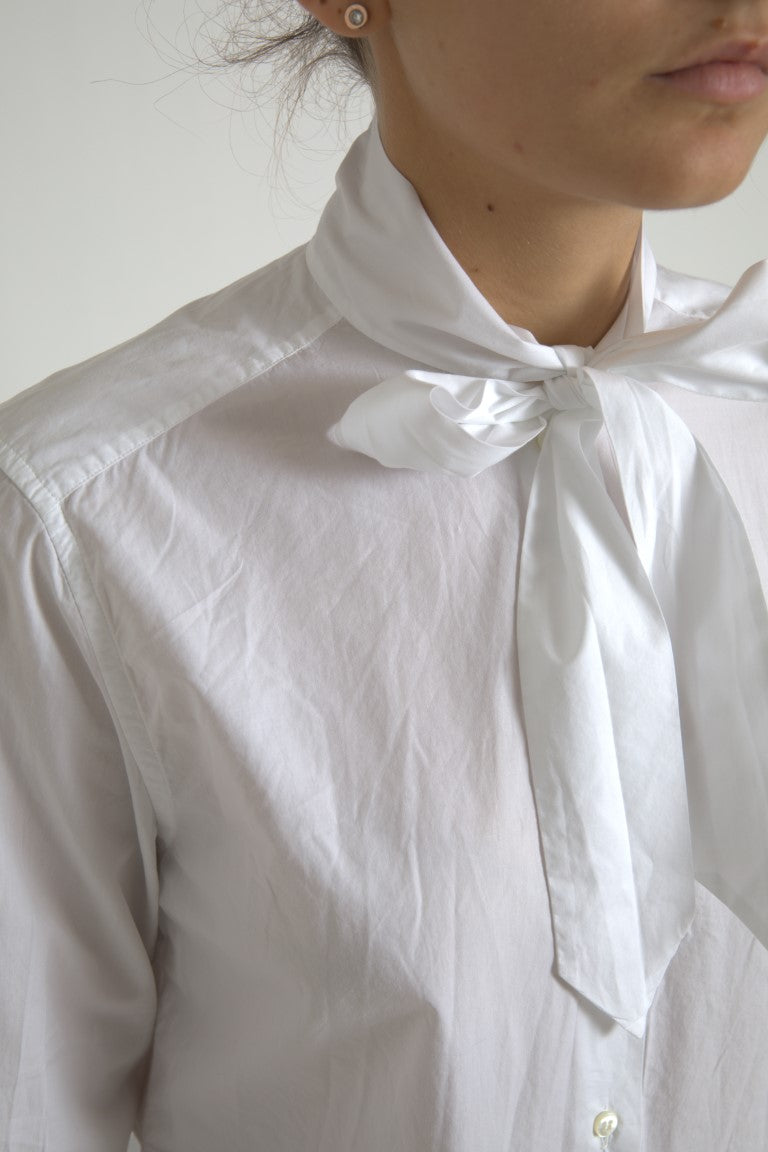 Haut en coton blanc Dolce & Gabbana avec col ascot et manches longues, élégant et sophistiqué.