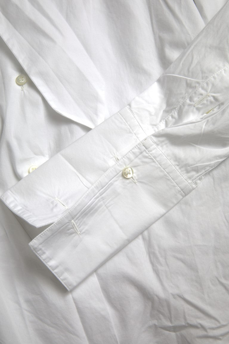 Chemisier blanc en coton Dolce & Gabbana avec col ascot et manches longues, élégant et sophistiqué.