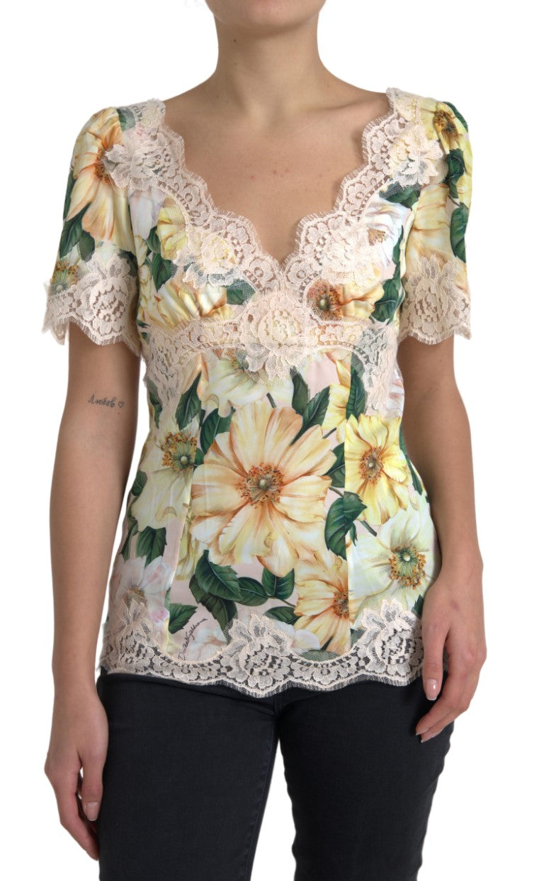 Chemisier Dolce & Gabbana à fleurs multicolores en dentelle, col en V, style élégant et féminin.
