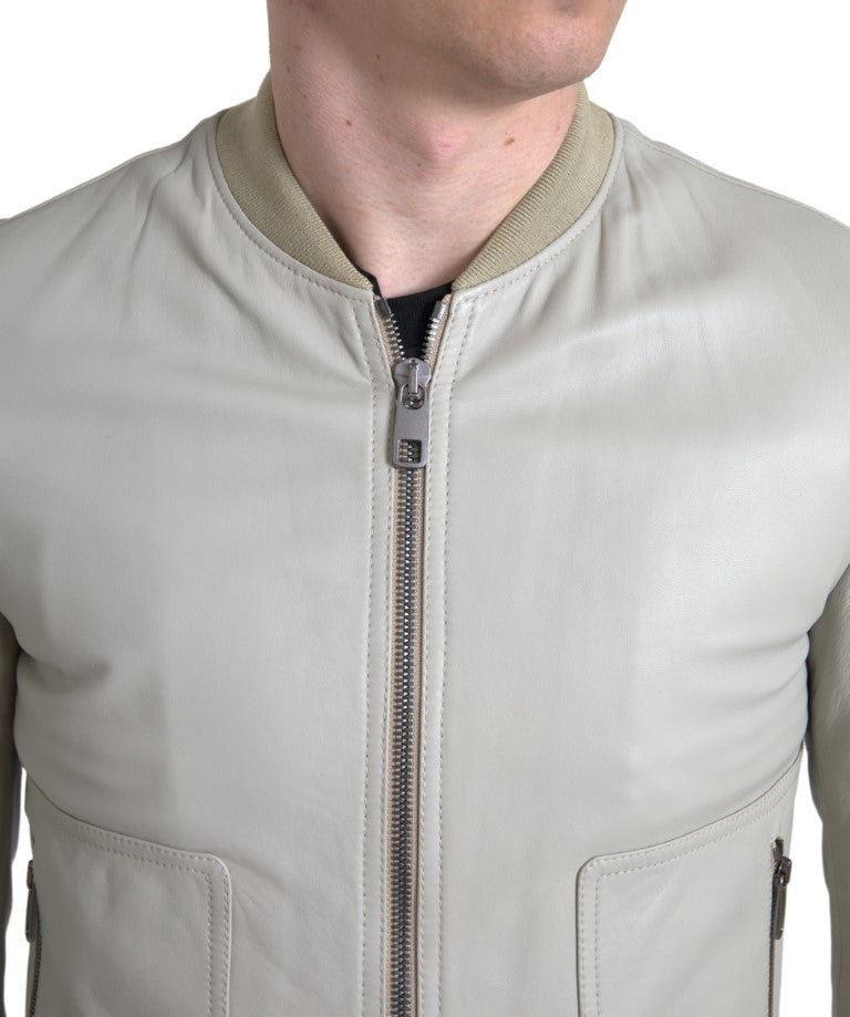 Blouson bomber en cuir crème Dolce & Gabbana avec zip frontal, style élégant et moderne, visible sur l'image.
