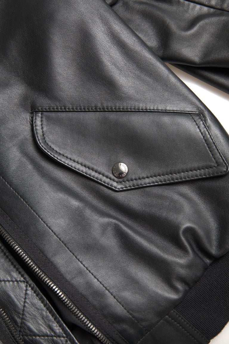 Veste bomber noire en cuir Dolce & Gabbana avec fermeture éclair complète, style élégant et moderne.