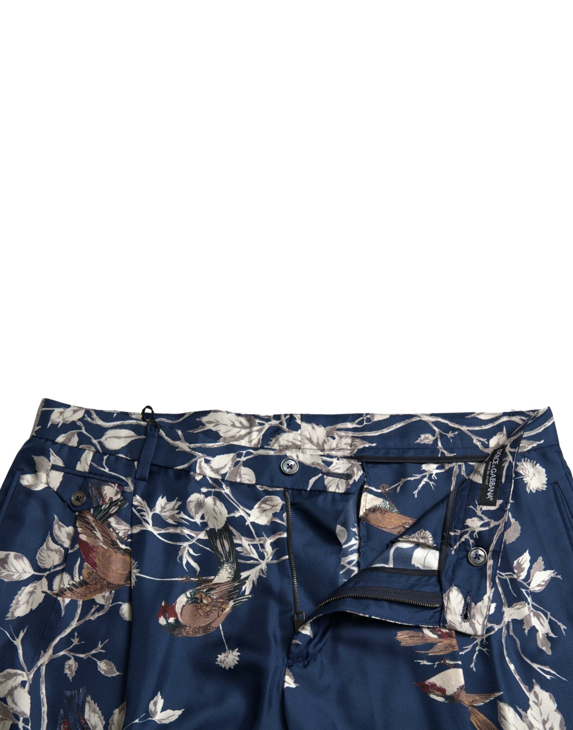 Shorts bermuda en soie à motifs floraux bleus de Dolce & Gabbana pour hommes, avec design élégant et tissu léger.