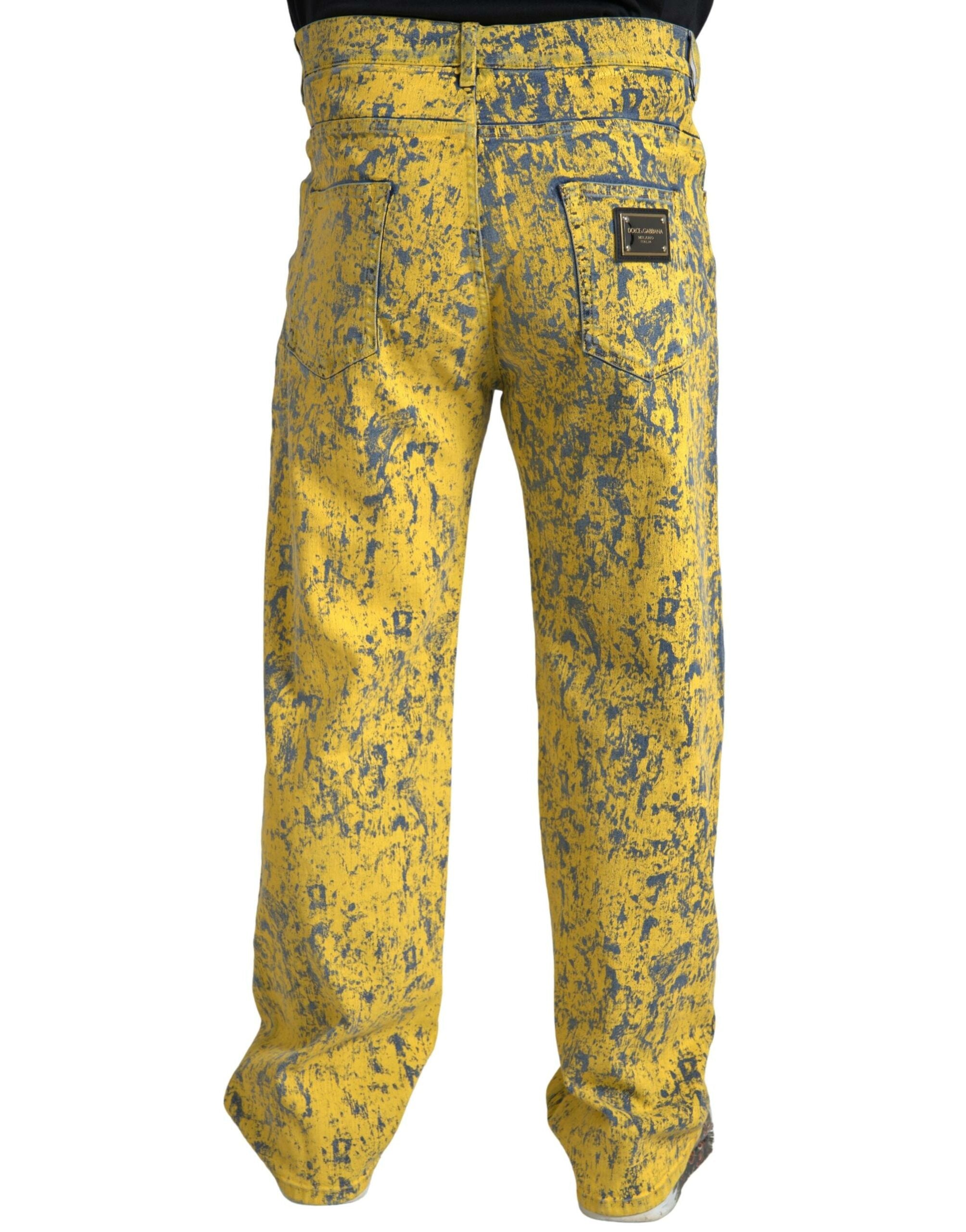 Jeans en denim droit à effet tie-dye jaune de Dolce & Gabbana, coton, style moderne et décontracté.