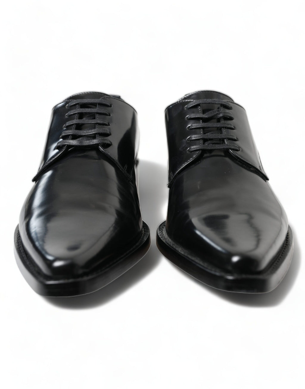 Chaussures plates noires en cuir Dolce & Gabbana avec laçage formel, élégantes et sophistiquées pour femmes.