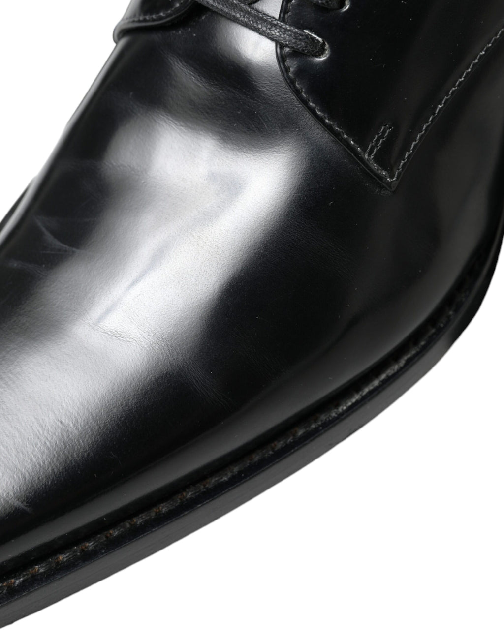 Chaussures plates noires en cuir Dolce & Gabbana, chaussures formelles à lacets élégants.