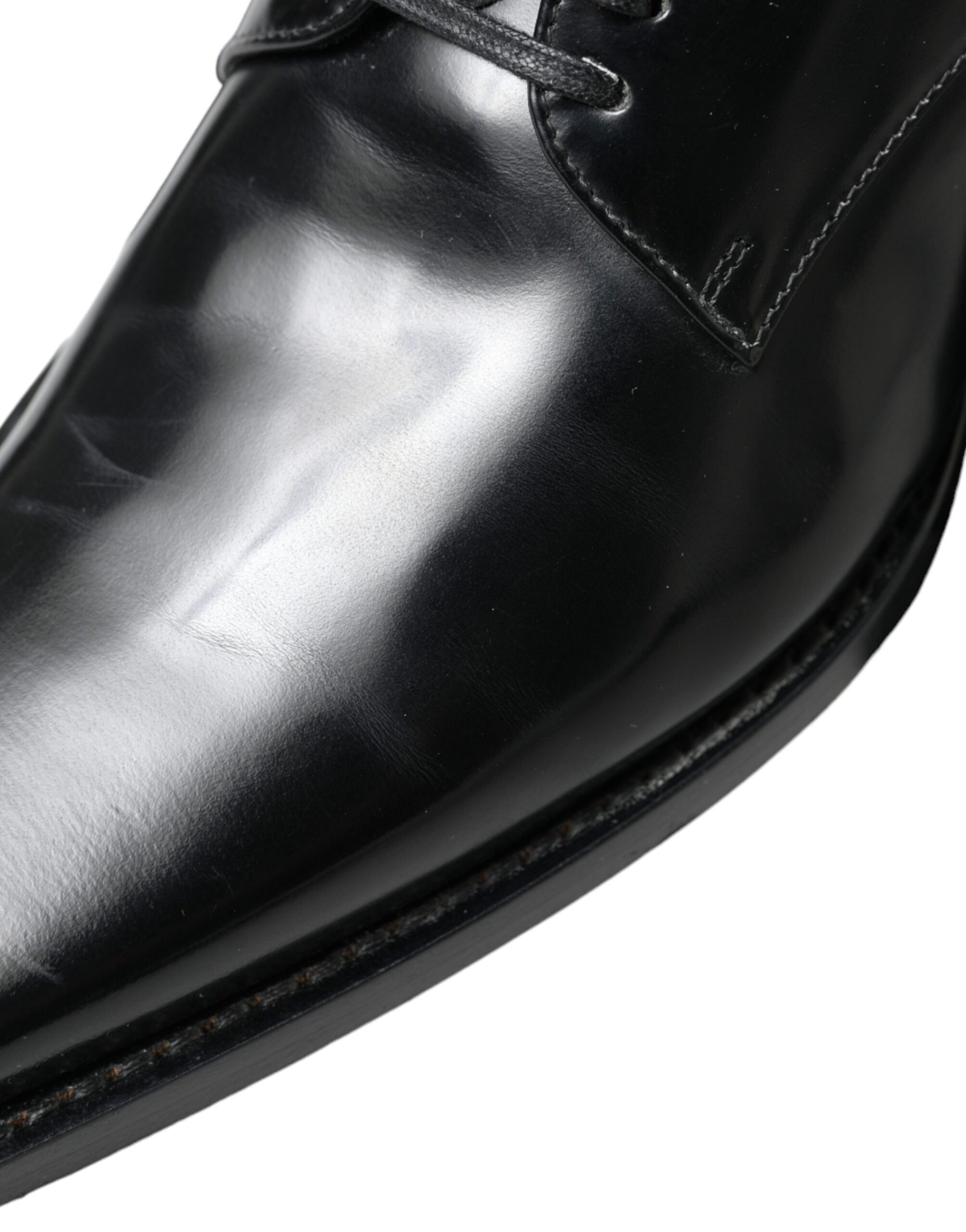 Chaussures plates noires en cuir Dolce & Gabbana, chaussures formelles à lacets élégants.