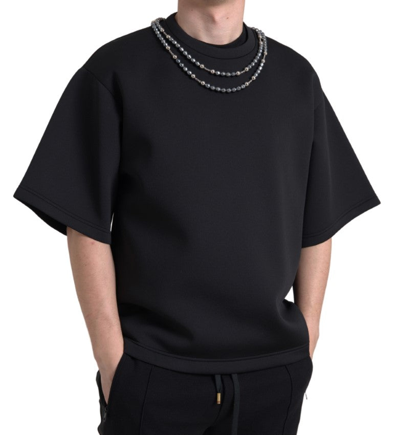 T-shirt en polyester noir Dolce & Gabbana avec collier orné de détails brillants, style élégant et moderne.