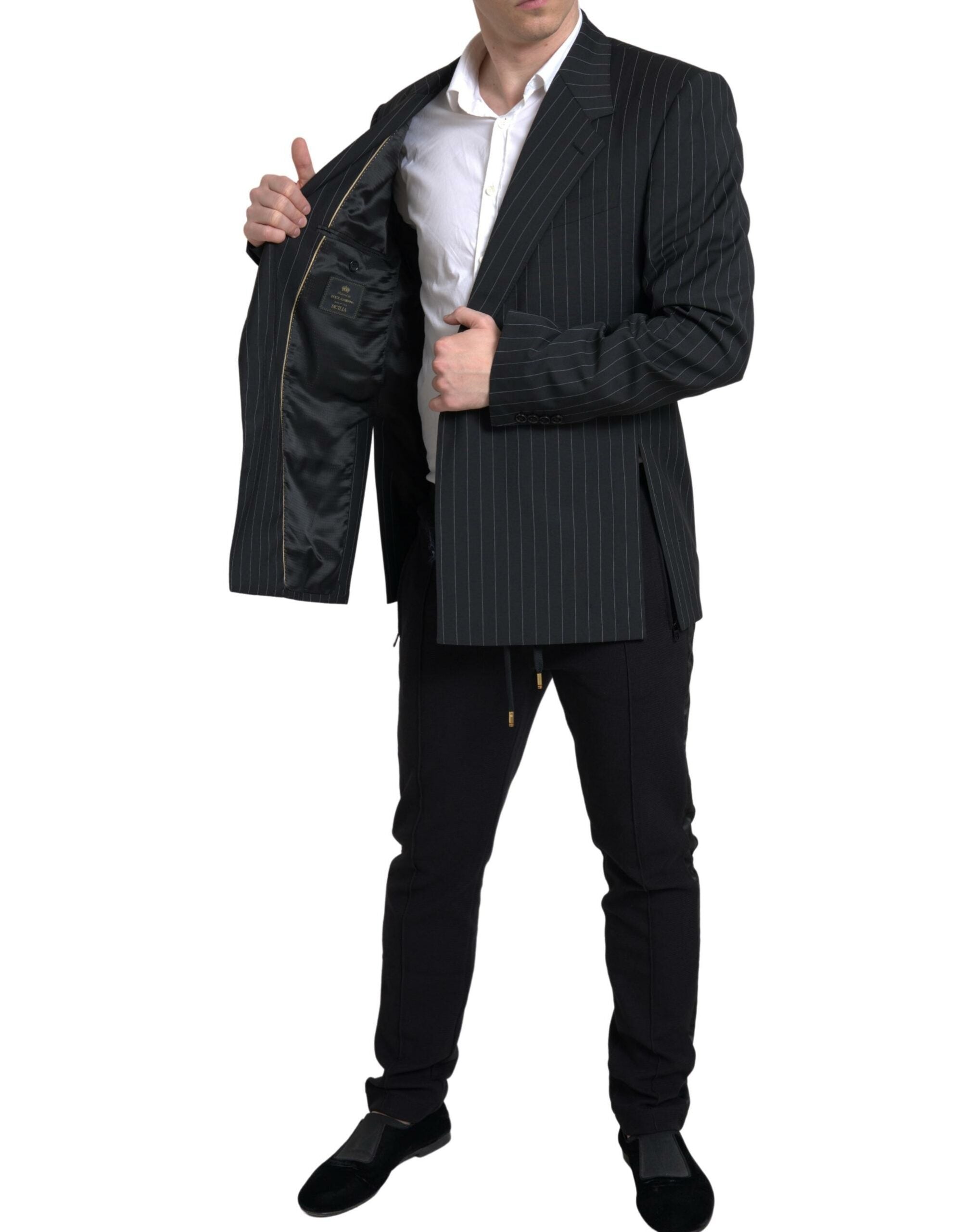Veste blazer noire à rayures Dolce & Gabbana Sicilia à un bouton, coupe classique, détails élégants, vue de face sur mannequin.