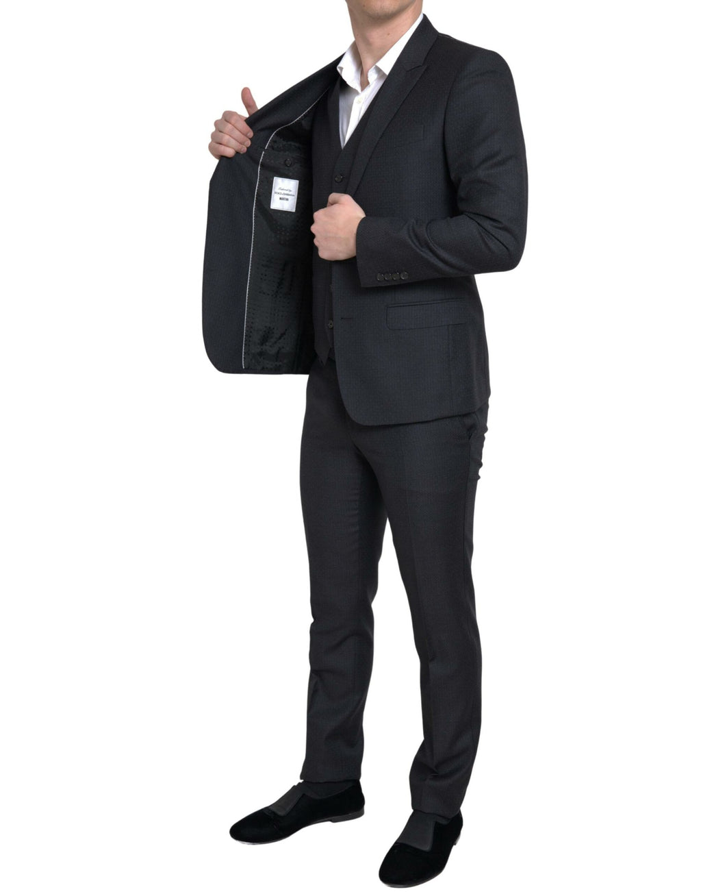 Costume noir Dolce & Gabbana trois pièces à boutonnière simple pour homme, élégant et sophistiqué, vue de face.