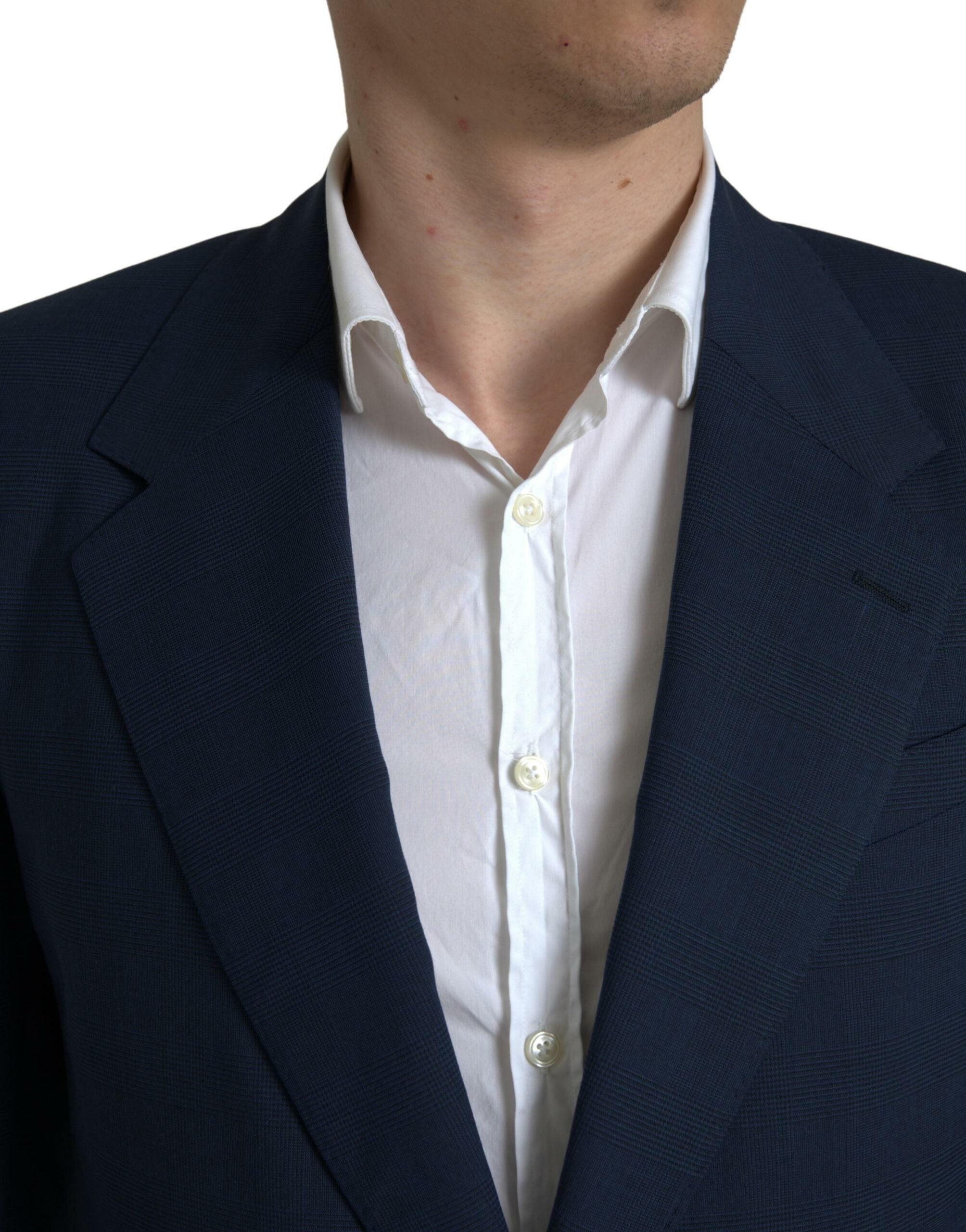 Costume bleu Dolce & Gabbana Sicilia à deux pièces, blazer croisé simple, style élégant et moderne.