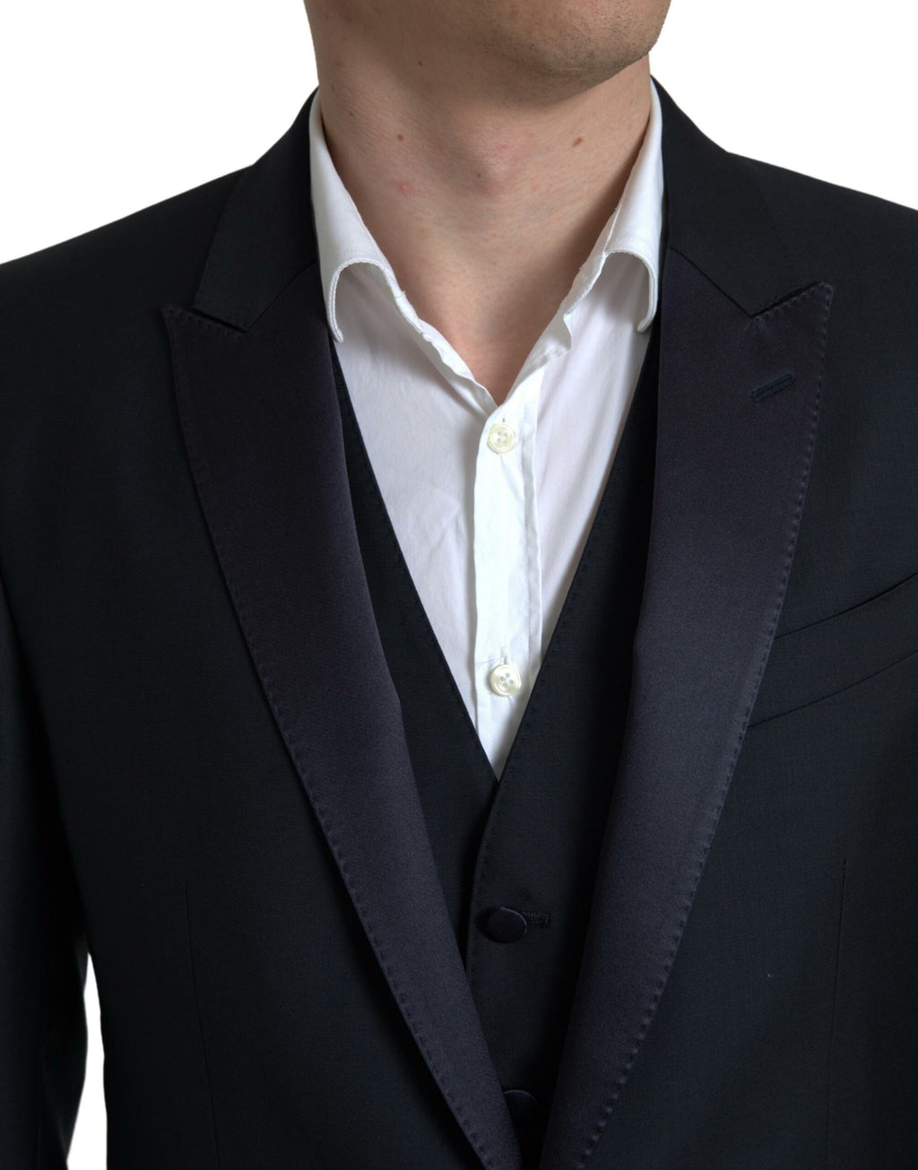 Costume Martini bleu Dolce & Gabbana à deux pièces, veste à double boutonnage simple et pantalon élégants.