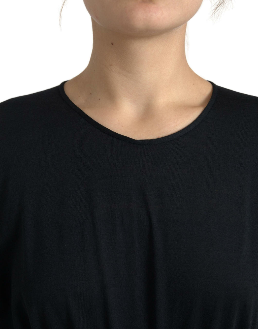 Robe noire en laine Dolce & Gabbana, robe trapèze midi élégante, près du corps, avec détails sophistiqués et coupe flatteuse.