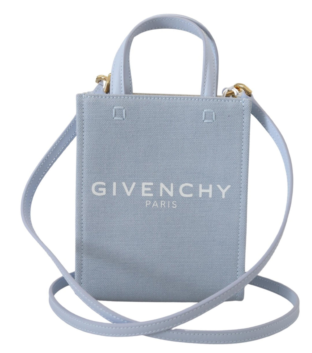 Sac à bandoulière Givenchy Cloud Mini en canvas enduit bleu, vue verticale avec détails du design élégant.