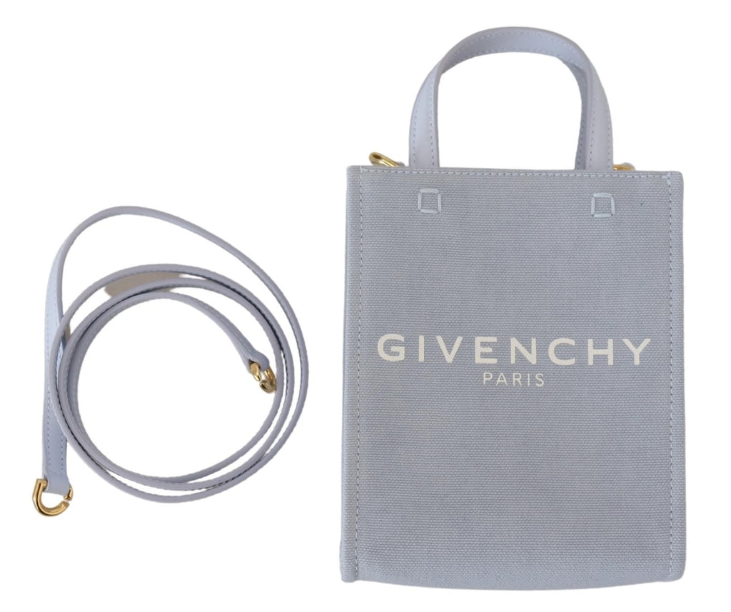 Sac à épaule Givenchy vertical en toile bleue enduite avec motif nuage, mini taille, design élégant et moderne.