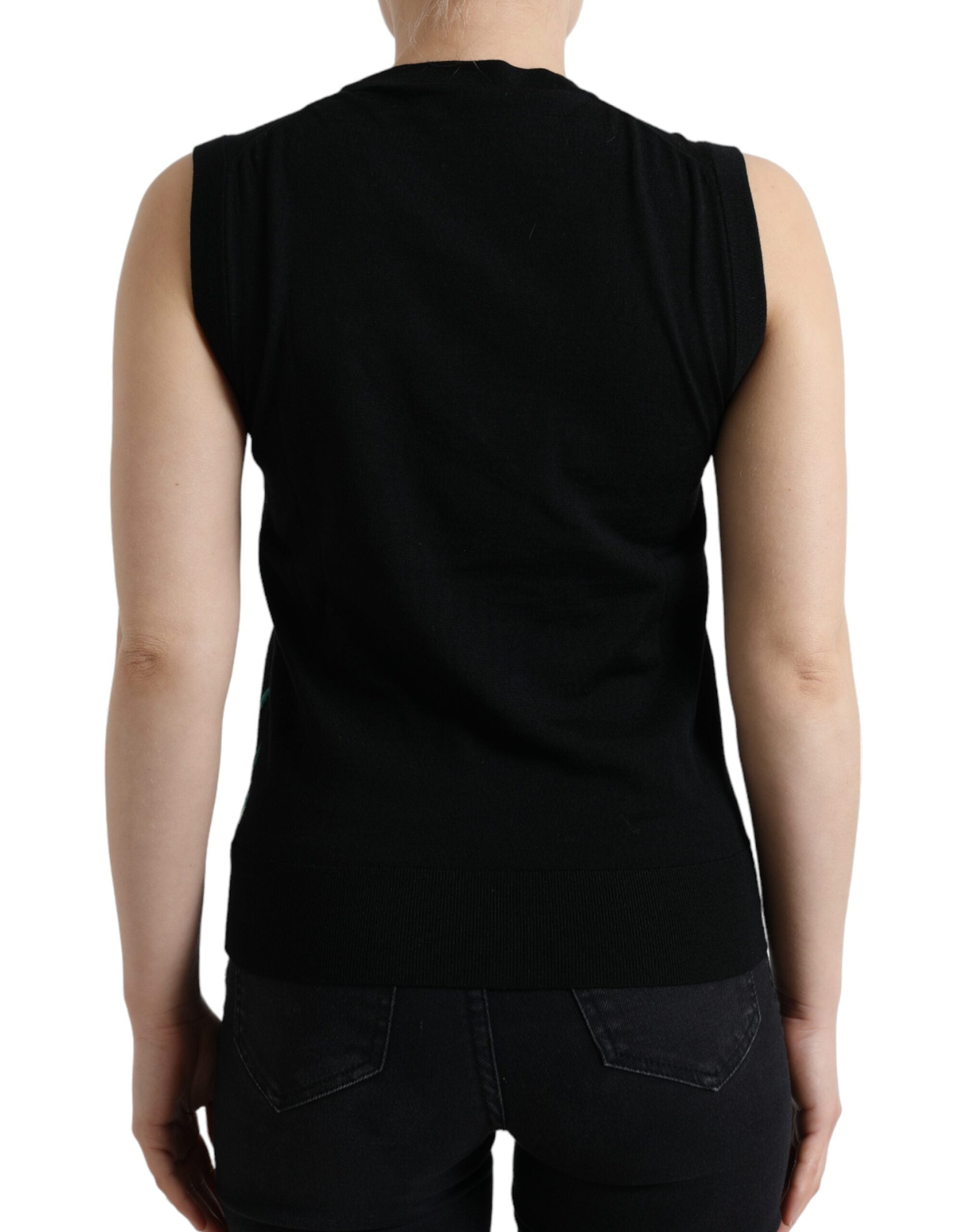 Gilet sans manches noir Dolce & Gabbana en laine avec motif oiseau, texture tricotée, porté sur un fond neutre.