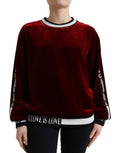 Pull en velours bordeaux Dolce & Gabbana à col rond, pull-over élégant avec texture douce et finition soignée.