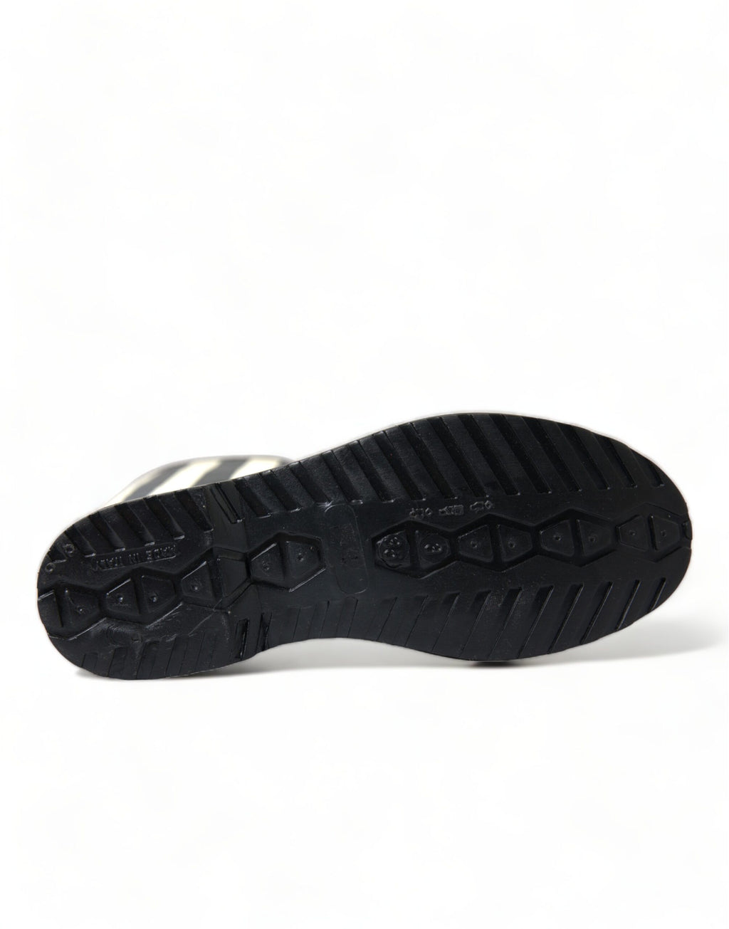 Bottes noires en caoutchouc Dolce & Gabbana, hautes jusqu'aux genoux, à semelles plates, pour femmes.