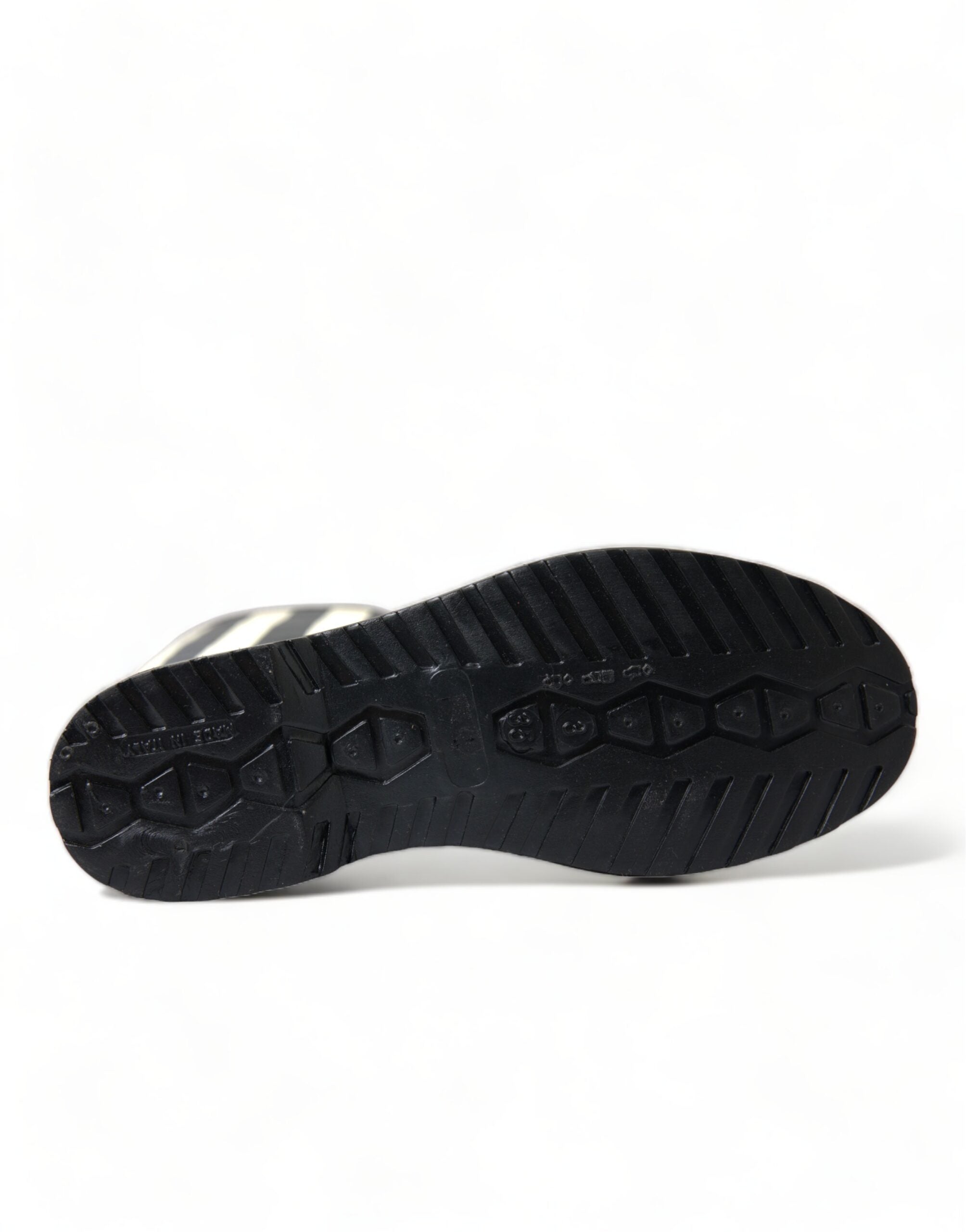 Bottes noires en caoutchouc Dolce & Gabbana, hautes jusqu'aux genoux, à semelles plates, pour femmes.