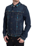 Veste en denim bleu Dolce & Gabbana avec pierres turquoise et détails cloutés, mode élégante et sophistiquée.