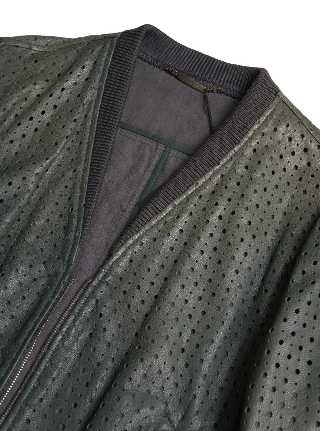 Veste bomber en cuir perforé vert Dolce & Gabbana, style élégant avec détails sophistiqués, vue de face sur fond neutre.