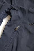 Sweat à capuche bleu Dolce & Gabbana en polyester avec logo, fermeture éclair intégrale, porté sur mannequin.