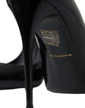 Chaussures à talons Dolce & Gabbana en cuir verni noir, élégantes et sophistiquées, vues de face.