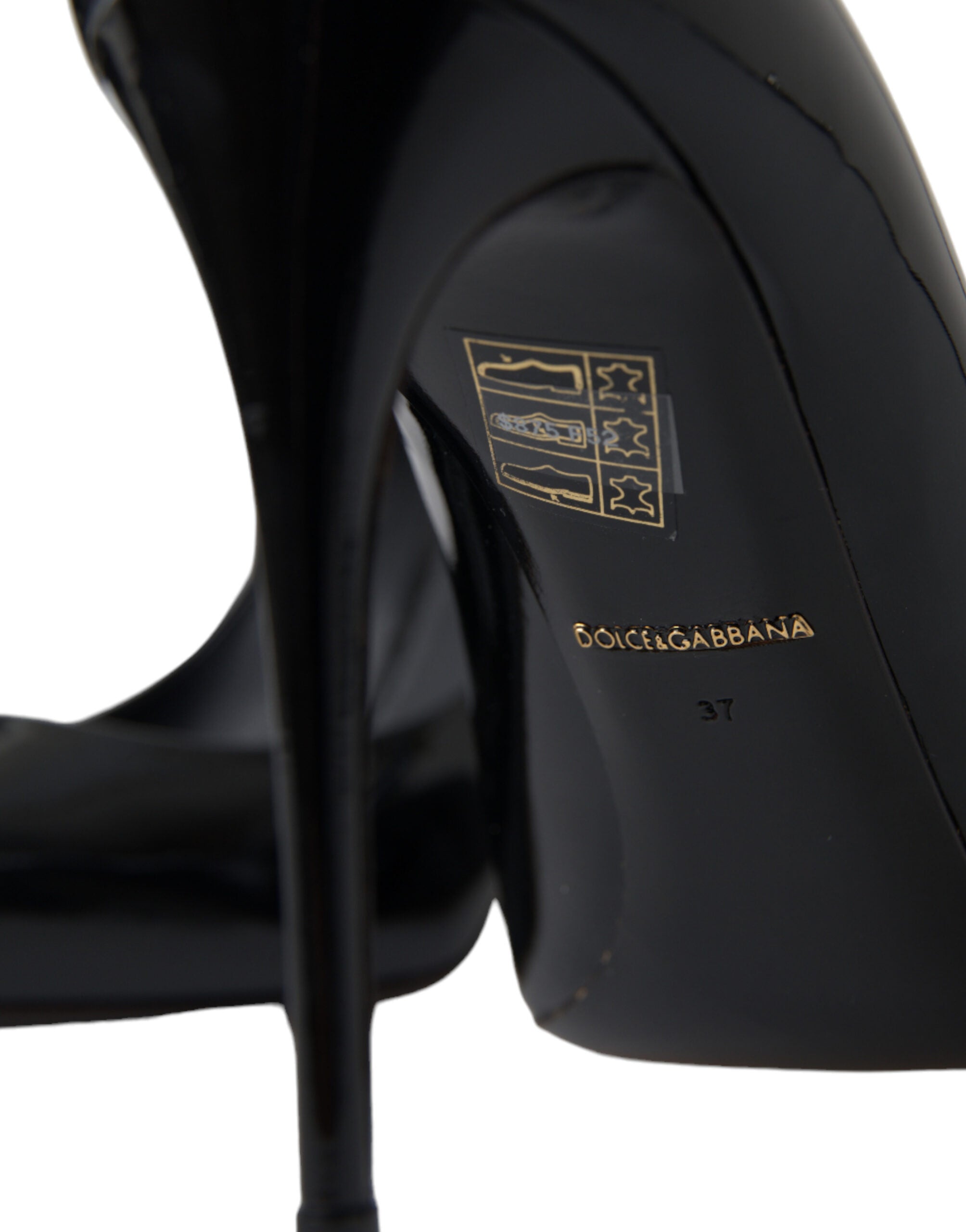 Chaussures à talons Dolce & Gabbana en cuir verni noir, élégantes et sophistiquées, vues de face.