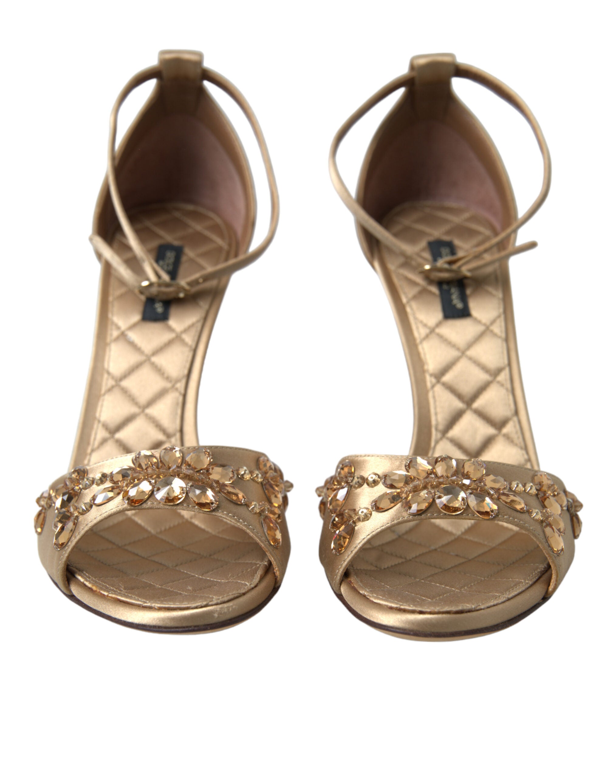 Sandales Dolce & Gabbana en satin doré avec bride à la cheville et cristaux, vues de côté.