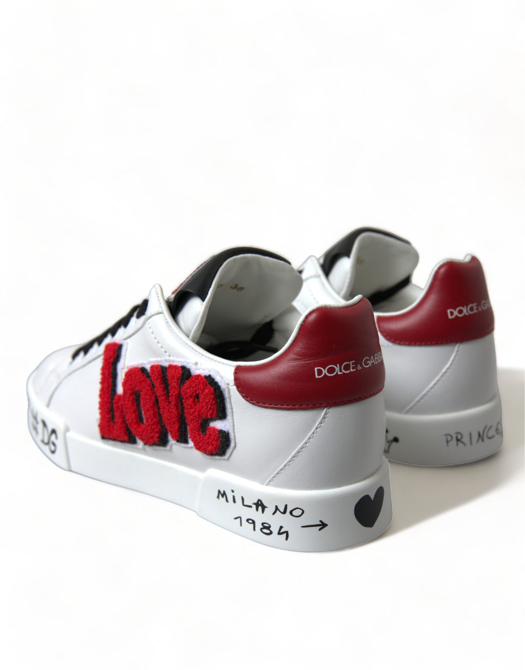Chaussures sneakers portofino classiques blanches Dolce & Gabbana avec patch d'amour, vue de face.