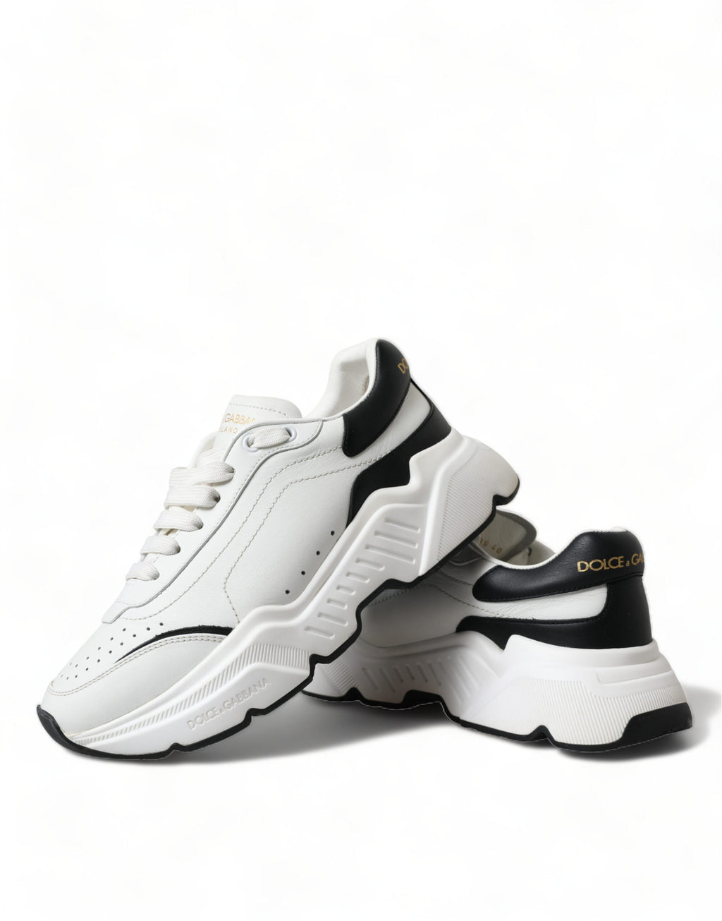 Chaussures basses Daymaster blanches et noires de Dolce & Gabbana, baskets élégantes pour un style tendance.