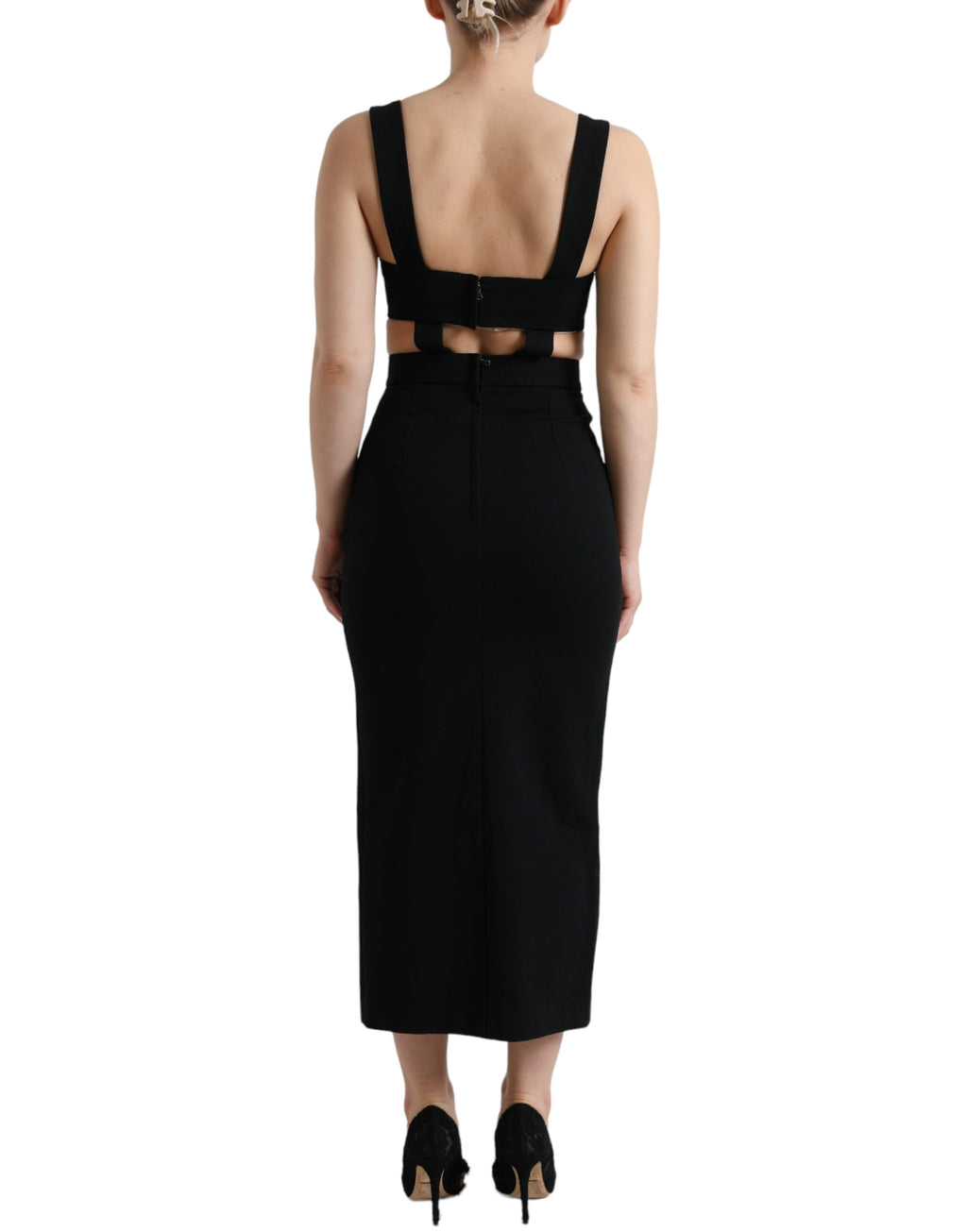 Robe midi noire sans manches Dolce & Gabbana, coupe ajustée et découpes élégantes, vêtement de mode sophistiqué.