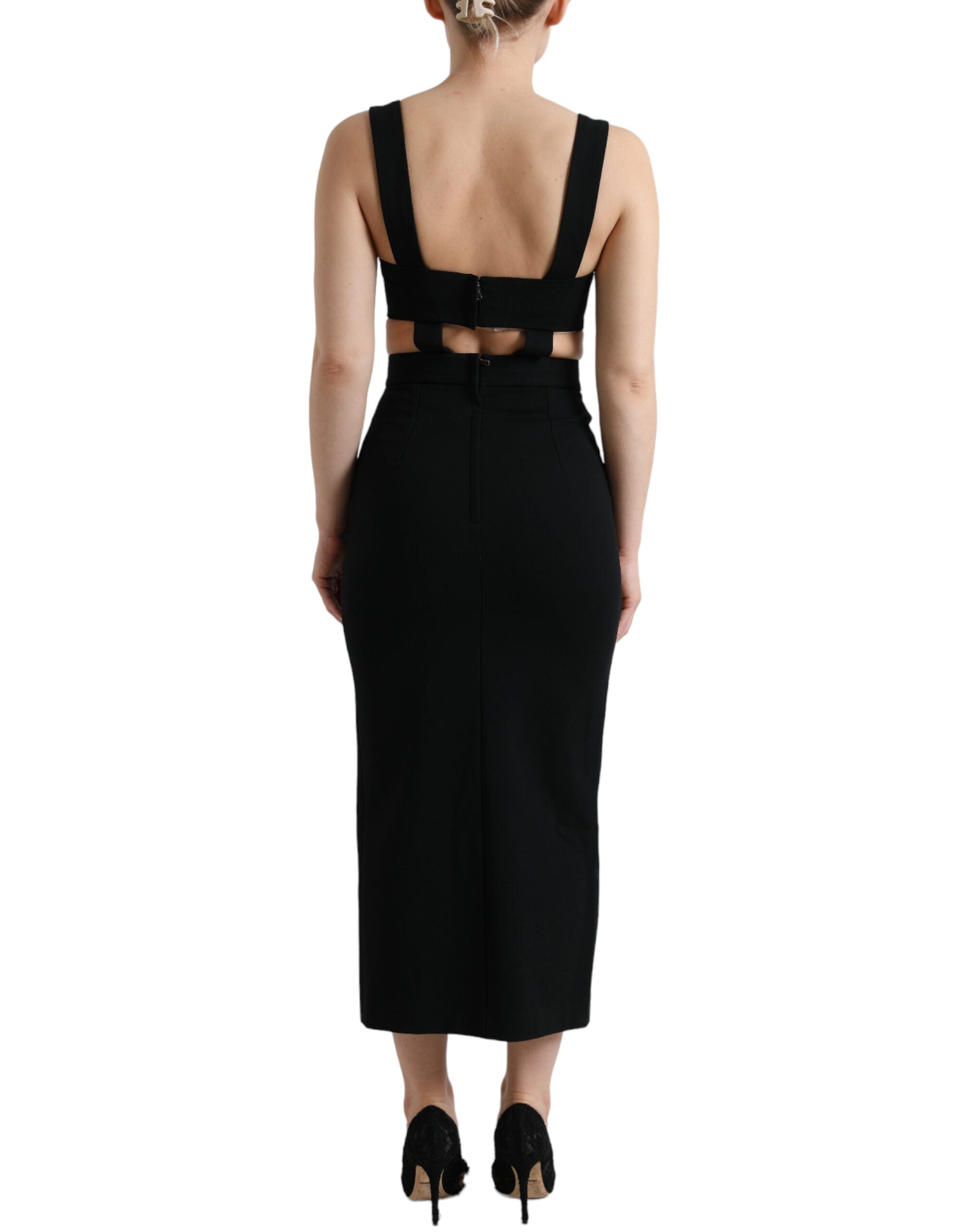 Robe midi noire sans manches Dolce & Gabbana, coupe ajustée et découpes élégantes, vêtement de mode sophistiqué.
