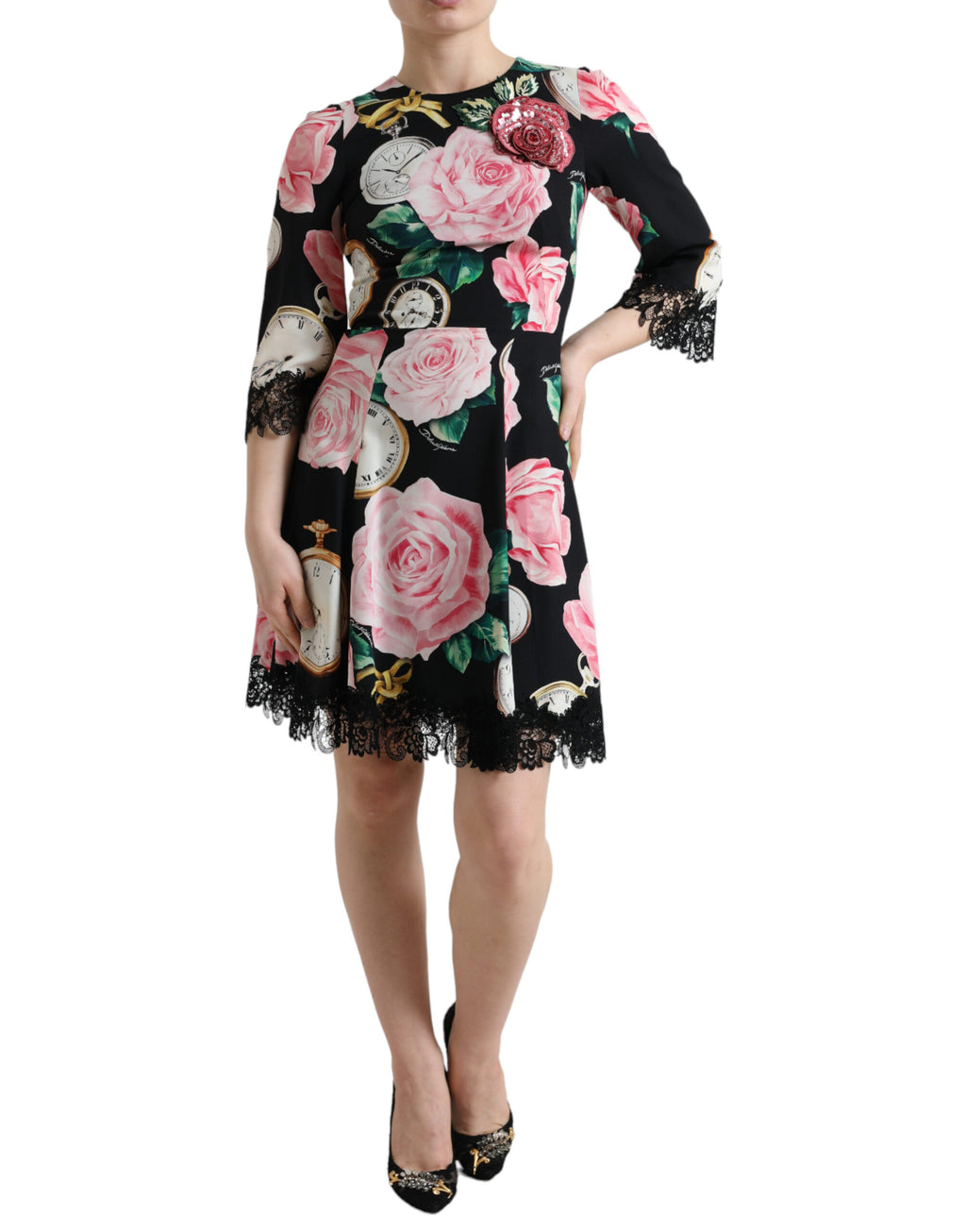 Robe en dentelle noire à fleurs avec embellissements, coupe en ligne A, de la marque Dolce & Gabbana.