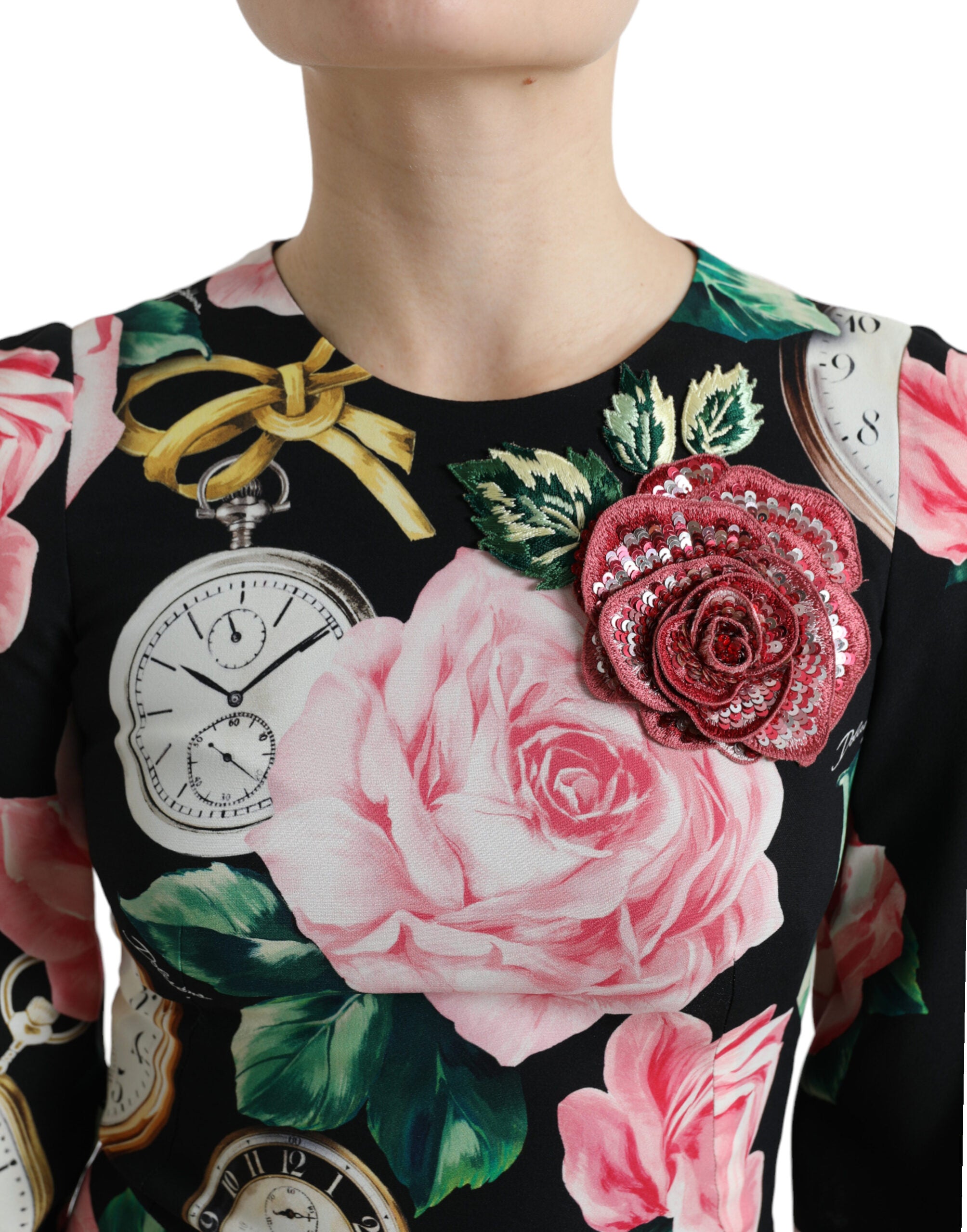 Robe noire à fleurs en dentelle embellie de Dolce & Gabbana, coupe évasée et élégante pour occasions spéciales.