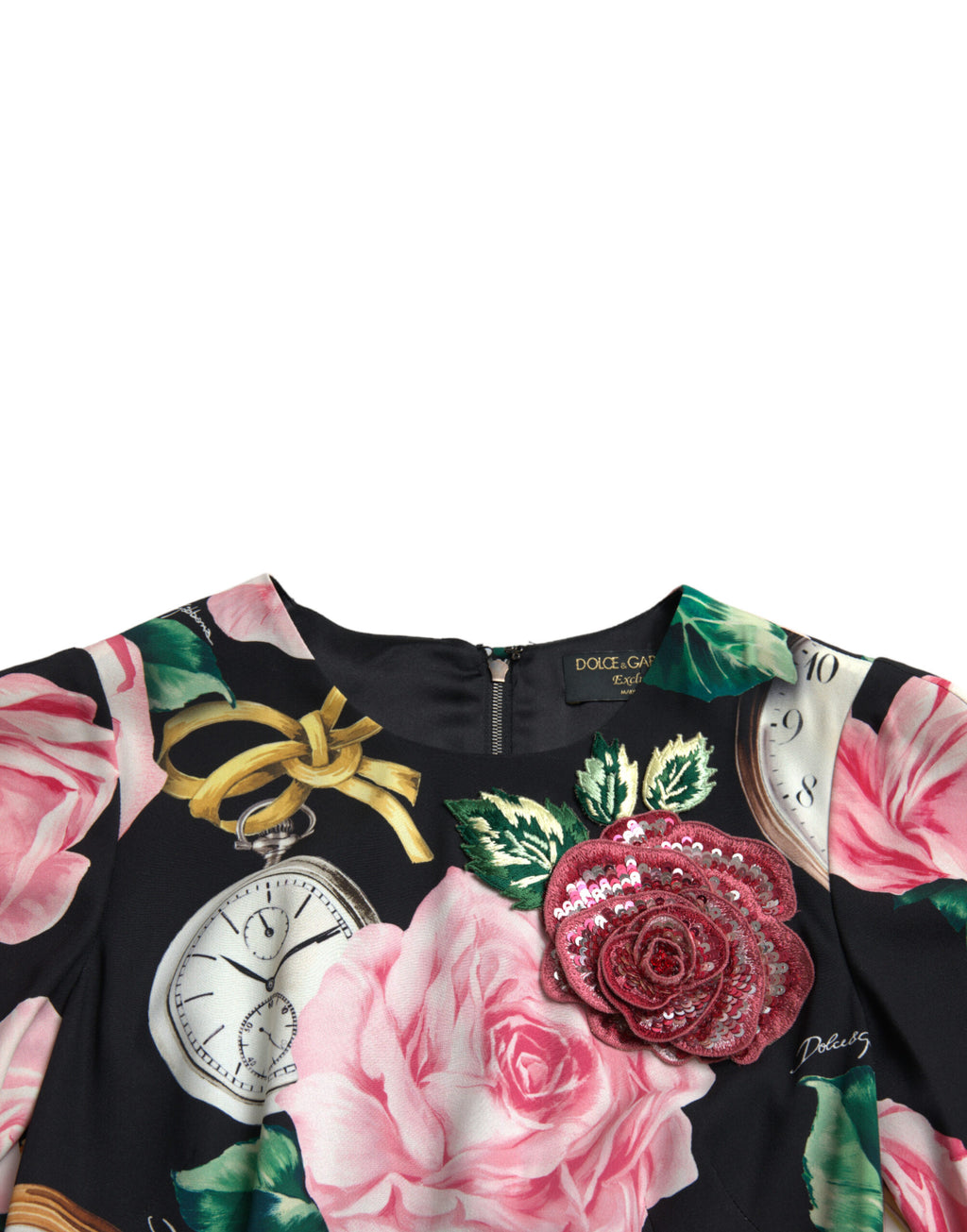 Robe Dolce & Gabbana noire à fleurs brodées en dentelle, coupe en ligne A élégante et sophistiquée.