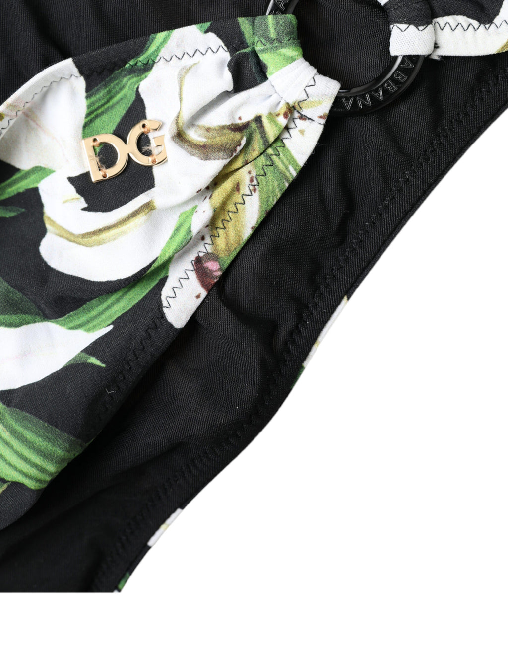 Bas de maillot de bain Dolce & Gabbana à imprimé lys noir, vêtement de plage féminin et élégant avec design coloré.