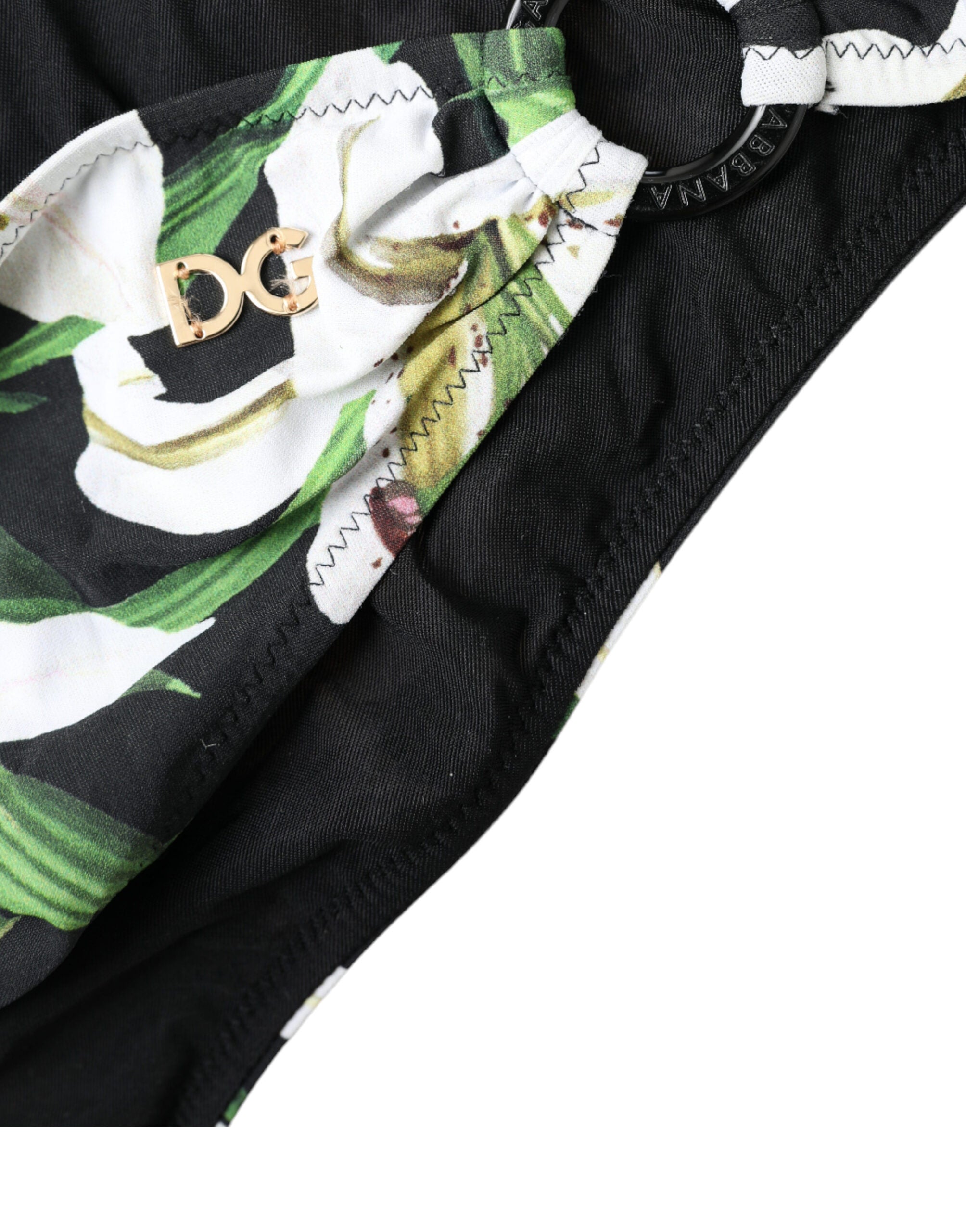 Bas de maillot de bain Dolce & Gabbana à imprimé lys noir, vêtement de plage féminin et élégant avec design coloré.