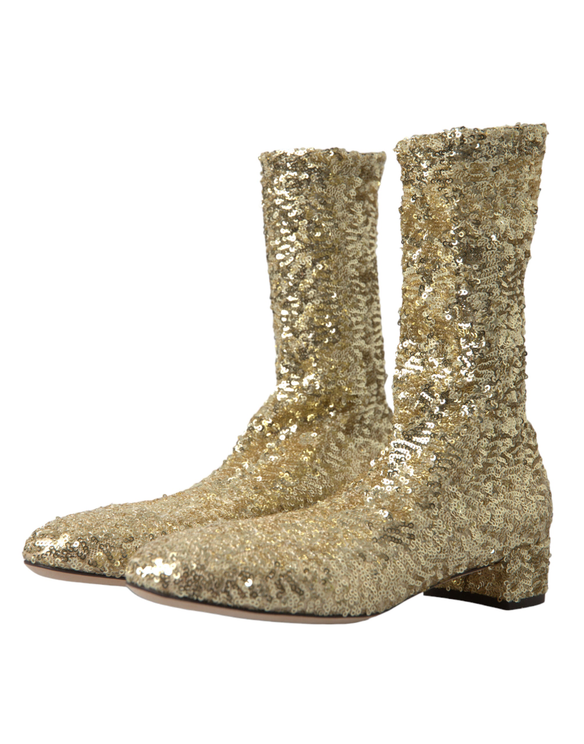 Bottes courtes dorées en sequins Dolce & Gabbana avec semelle extensible, mode élégante et brillante.