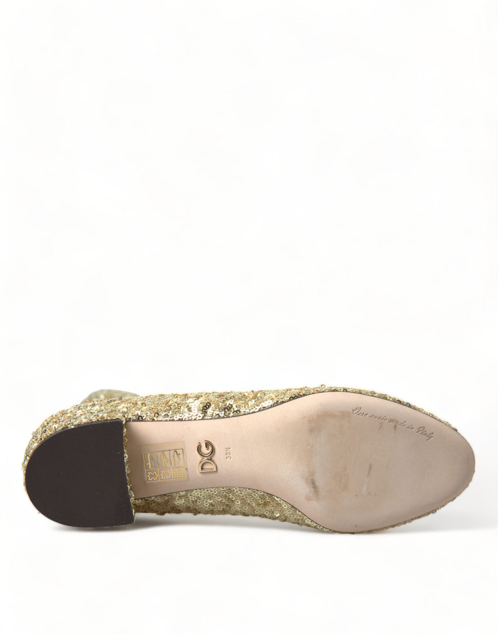 Bottes courtes dorées à sequins de Dolce & Gabbana, chaussures stretch élégantes avec finition brillante et style sophistiqué.