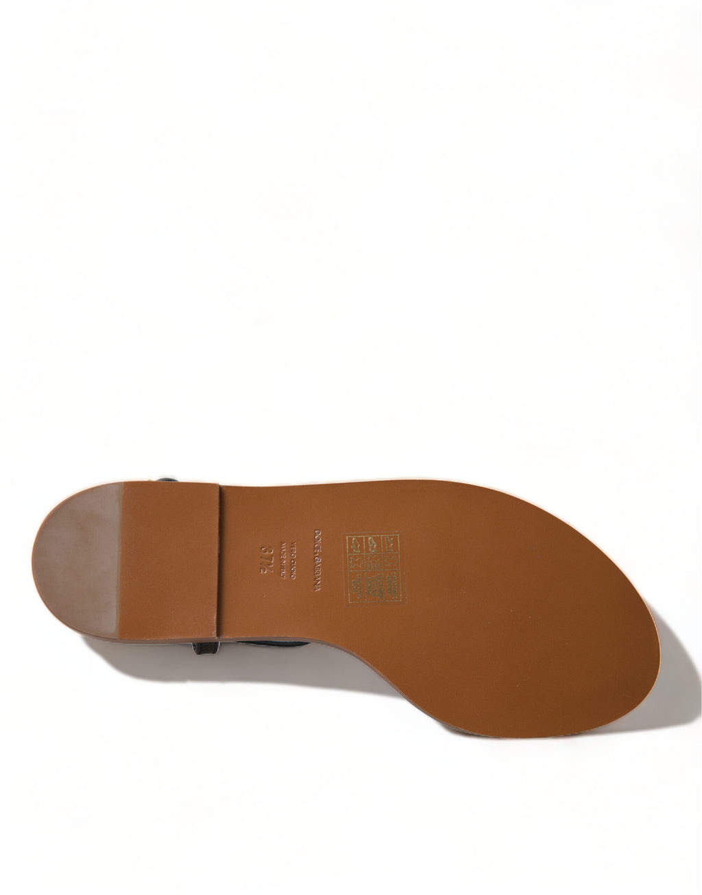 Sandales en cuir noir Dolce & Gabbana avec cristaux et détails en or, vue de côté.