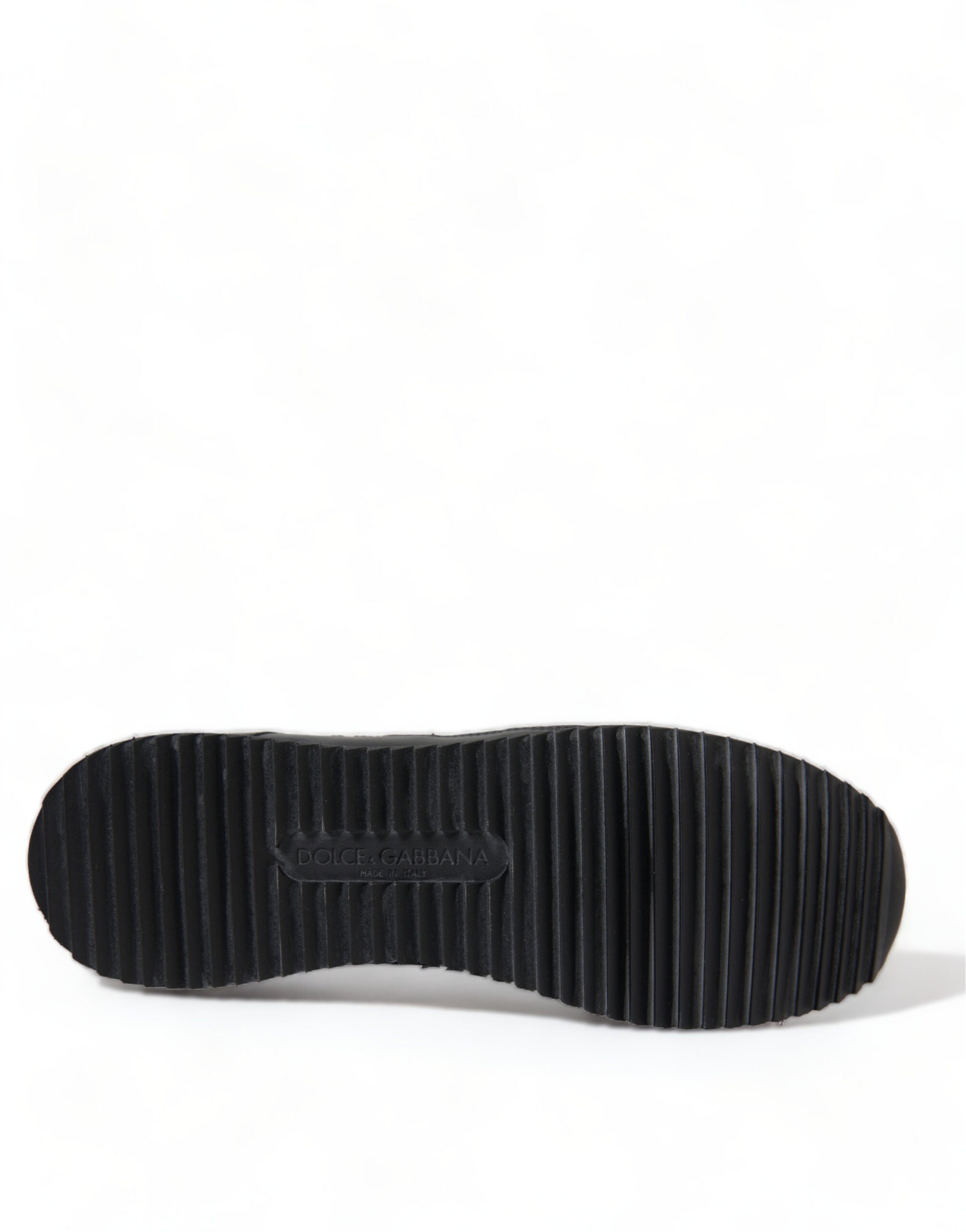 Chaussures sneakers en cuir noir avec dentelle florale Dolce & Gabbana, style élégant et sophistiqué.
