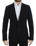 Blazer slim en laine noire de Dolce & Gabbana, ajusté, avec col en V et boutons, pour un style élégant et sophistiqué.