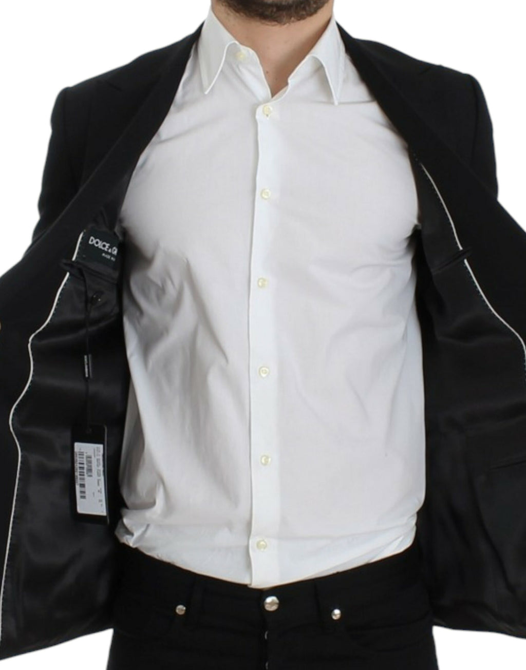 Veste blazer slim en laine noire Dolce & Gabbana portée par un mannequin, style élégant et moderne.