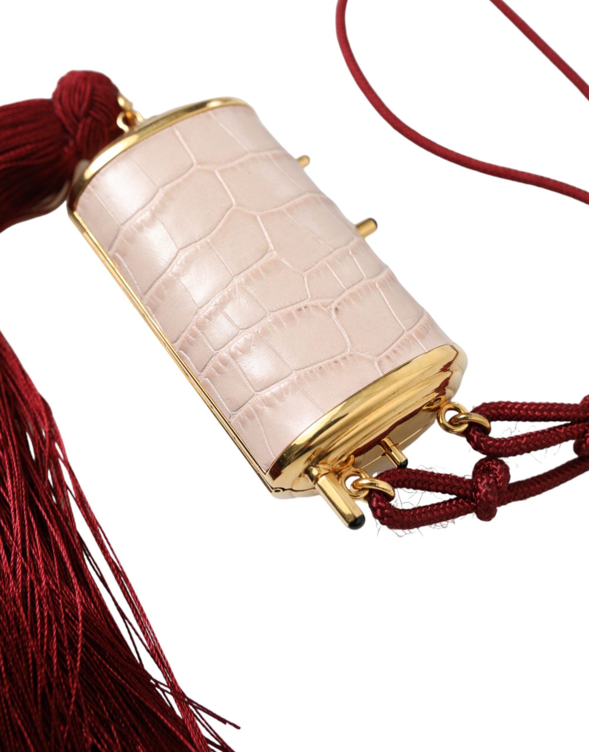 Trousse à maquillage Mini Dolce & Gabbana en cuir exotique rose avec miroir et pompon en tassel.